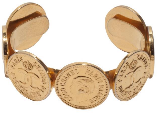 SZZ122T Signed gold-toned cuff with coin designs.