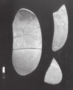 Plate 3. Sandstone smoothing tablet. The bodies were laid on a roughly east-west axis in a slightly contracted position, on their right side.