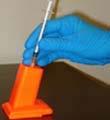 SPRAY AND AEROSOL PREVENTION To prevent exposure from sprays and aerosols: 1. Use of needle-locking syringes is recommended. 2. Fill syringes carefully to minimize air bubbles and frothing.