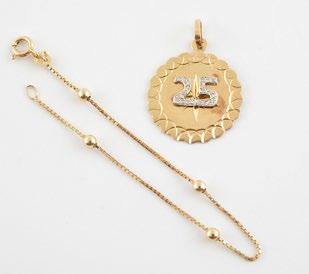 89 10K yellow gold chain and its gold filled pendant set with pink stones.