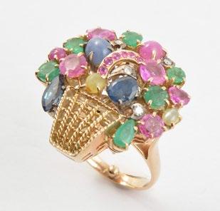 137 14K yellow gold ring set with coloured stones.