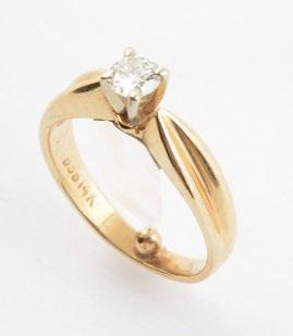 25 138 AND DIAMOND 14K yellow gold ring set with one round