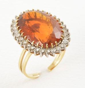 160 18K GOLD, CITRINE AND DIAMONDS 18K yellow gold ring set with a cabochon