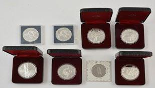 Also included 1 boxe of 8 coins proof issued to commemorate the 125th anniversary of the founding of the North-West Mounted Police.