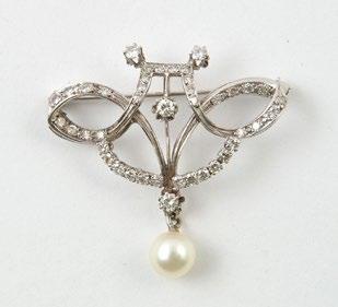 9, DIAMONDS AND PEARL 14K white gold brooch set with 42 brilliant cut diamonds