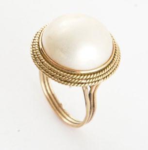 75 Also included a gemological certificate. 34 AND PEARL 14K yellow gold ring set with a white round pearl, 6.
