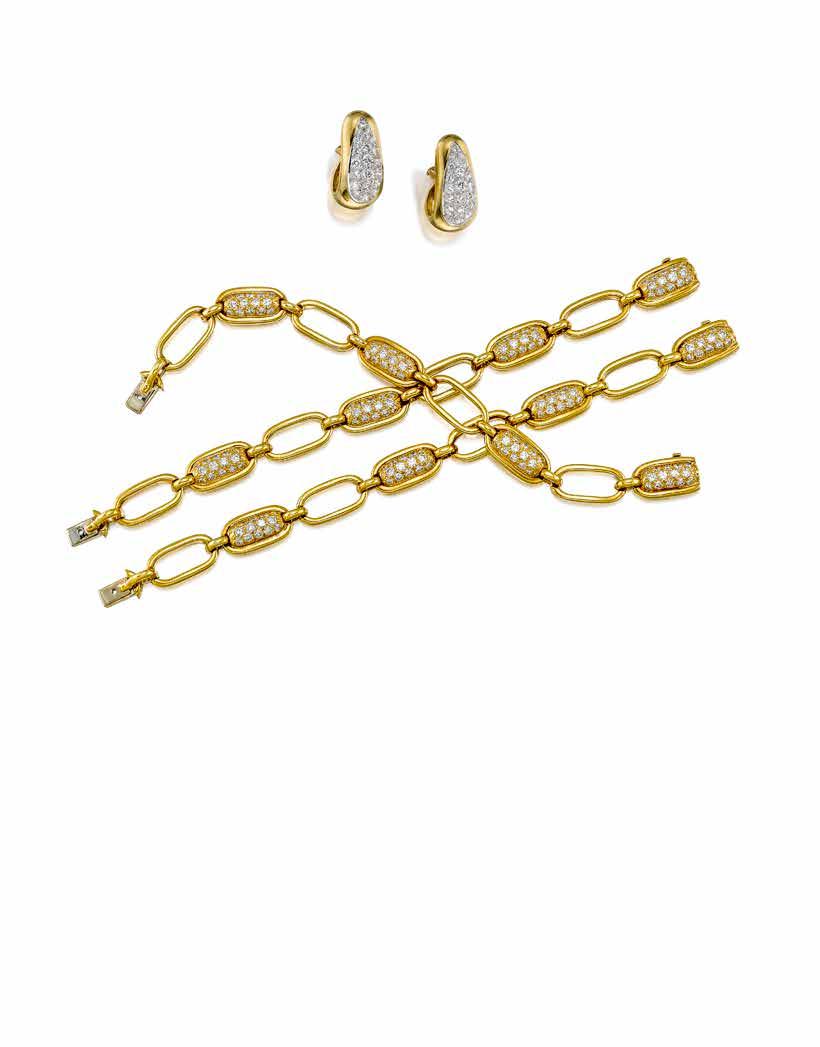 61 62 61 A PAIR OF 18K GOLD AND DIAMOND EAR CLIPS, VAN CLEEF & ARPELS designed as "J"-hoops, pavé-set with round brilliant-cut diamond centers; signed VCA, no.