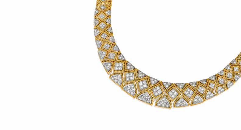 97 A DIAMOND NECKLACE, RUSER with round brilliant-cut diamonds set in navette and triangular platinum links across the center, with twisted roped borders and navette patterning extending to the