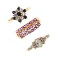 To include a sapphire and cubic zirconia cluster ring, an amethyst ring, and two further cubic zirconia rings.