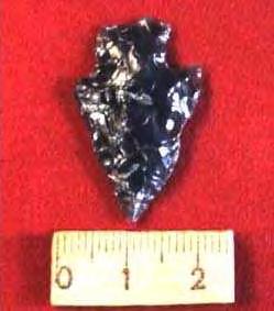Figure 56. Projectile point of gray obsidian (lot #34, artifact #3). 1 orange jar, 18.5 cm in height and 23.0 cm in diameter 1 small brownish-red jar, with paint on the lower half of the body, 7.