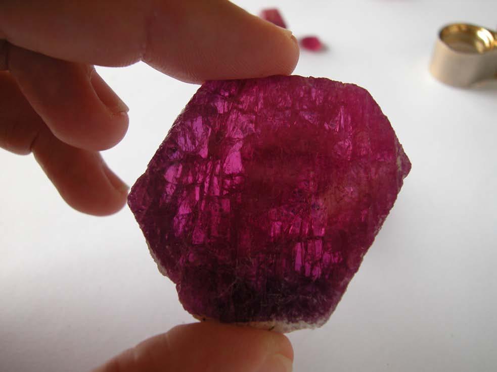 Mozambique Ruby Generally flat crystals and fragments, often heavily