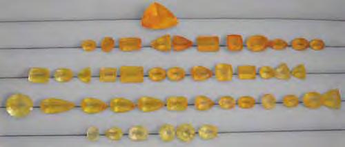 Figure 20. The stones in this first parcel of faceted Sunset quartz ranged from approximately 1 to 19.5 ct. Photo by M. Macrì.