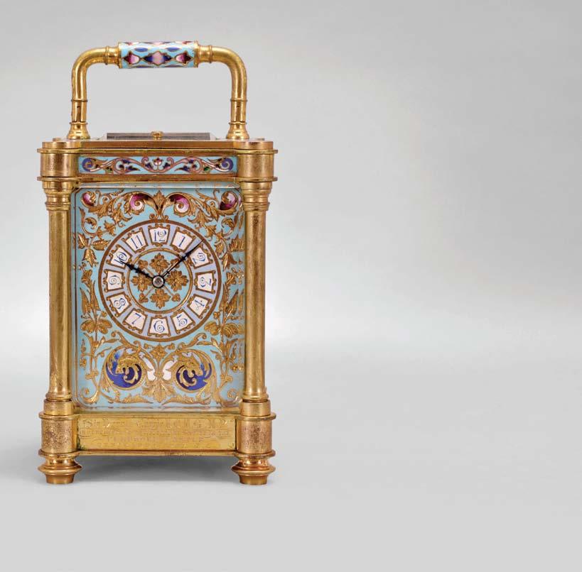 651 France, an unusual, champlevé enamel decorated, pillars style hour repeating carriage clock, the gilt case with outset corners, turned feet and columns, the base, frieze, and top with scrolling
