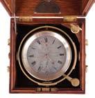 spring, Roman numeral silvered dial with wind indicator and gold spade and poker hands, with gimballed, lacquered brass bowl, and contained in a later, three tier mahogany box with brass furniture,