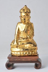 Small gilt wood statuette of seated Buddha.