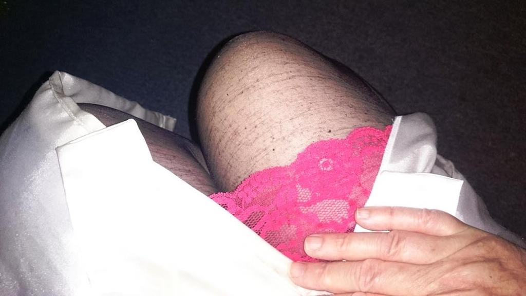 Andrea was shocked. He glanced up at Mrs S and as he did so he noticed a little flash of red lace from under Mrs S s cream dressing gown. Then he smiled as the penny dropped.