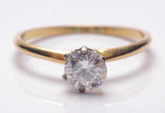 184 184. A diamond mounted solitaire ring with circular, brilliant-cut diamond 6.0mm x 3.5mm and estimated to weigh 0.75cts, the shank stamped Tiffany & Co. 600-800 185 185.