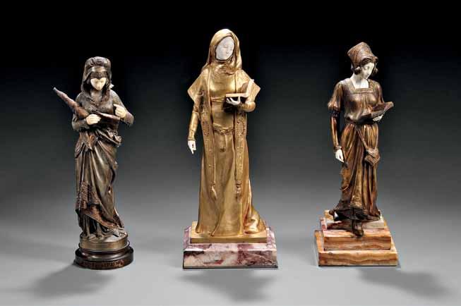 582 581 583 582 After Henri Louis Levasseur (French, 1853-1934) Gilt-bronze and Ivory Figure of a Nun Reading, cast with one hand pointing down and the other supporting her book, raised on a marble