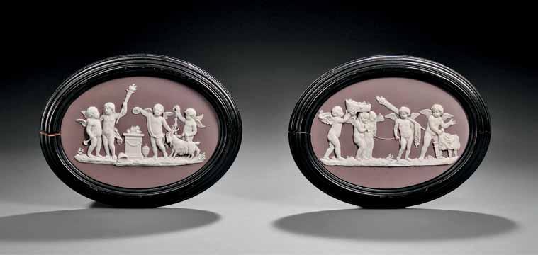189 189 Pair of Wedgwood Lilac Jasper Dip Oval Plaques, England, mid-19th century, applied white classical relief depictions of The Marriage of Cupid and Psyche and Sacrifice to Hymen, impressed