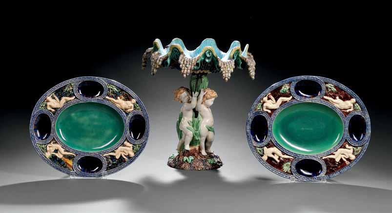 244 243 243 243 Two Majolica Serving Dishes, England, 19th century, each oval, similarly molded and decorated with four wells to a wide border decorated with classical figures surrounding a shallow