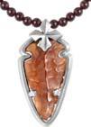 K10-5491- AMB Carved Amber Arrowhead in a Crown Setting K10-5488-JET Carved Jet Arrowhead in a Bezel Setting with MB Cross Motif K10-5491-IVO Carved Ivory Arrowhead in a Crown Setting K10-5492-AMB