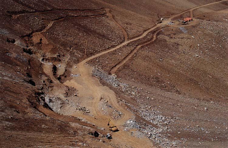 Figure 6. This view of the Flor de los Andes concession shows a series of small cuts that have been explored and mined for lapis lazuli. Photo 2000 Fred Ward.