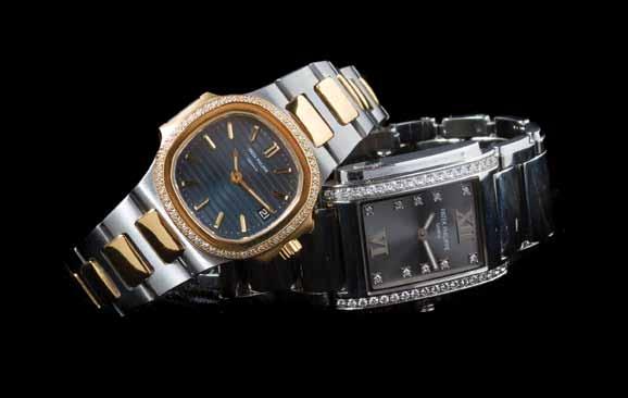 60 An 18 Karat Yellow Gold and Stainless Steel Ref. 4700 Nautilus Wristwatch, Patek Philippe, 30.00 x 27.
