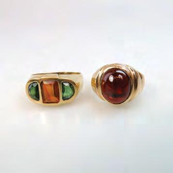 175 18K YELLOW GOLD RING set with an oval bloodstone seal, size 10, 8.7 grams $160 240 176 10K YELLOW GOLD RING set with 14 small full cut tanzanites, size 6 1/2, 10.