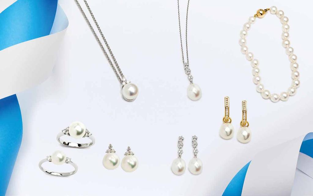 18ct gold, cultured pearl and trefoil diamond set pendant with chain. 520.00 18ct gold, freshwater cultured pearl and diamond set pendant with chain. 1050.