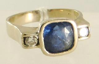 Lot # 459 459 18k white gold sapphire and diamond ring, sapphire approx. 4.38cts, dia. approx. 0.33cts.