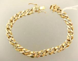 532 533 534 535 Lot # 514 514 515 516 517 518 519 520 521 522 523 524 525 526 14k yellow and white gold curb link bracelet.