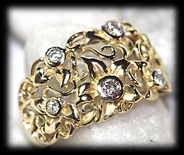 Estimate: R3,000 R5,400 69 18 carat yellow and white polished gold classic diamond RING of broad design.