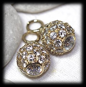 EARRINGS. Attached: pair of 9 carat yellow polished gold blur topaz ATTACHMENTS.