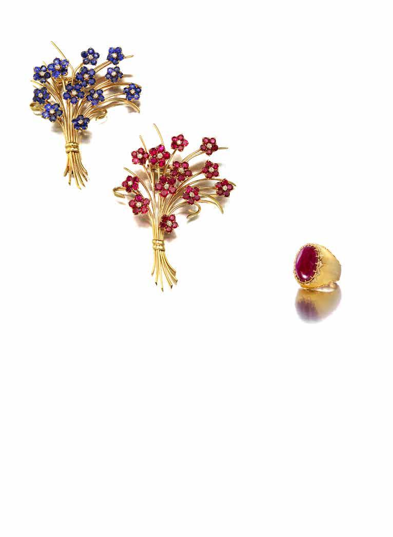 10 11 PROPERTY OF VARIOUS OWNERS 10 A COMPANION PAIR OF RUBY AND SAPPHIRE HAWAII BROOCHES, VAN CLEEF & ARPELS, CIRCA 1940 each designed as a bouquet of flowers, set with circular-cut rubies, the