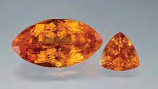 Examination of the two cut stones gave the following properties: color medium orange and medium yelloworange; RI 1.780; hydrostatic SG 4.