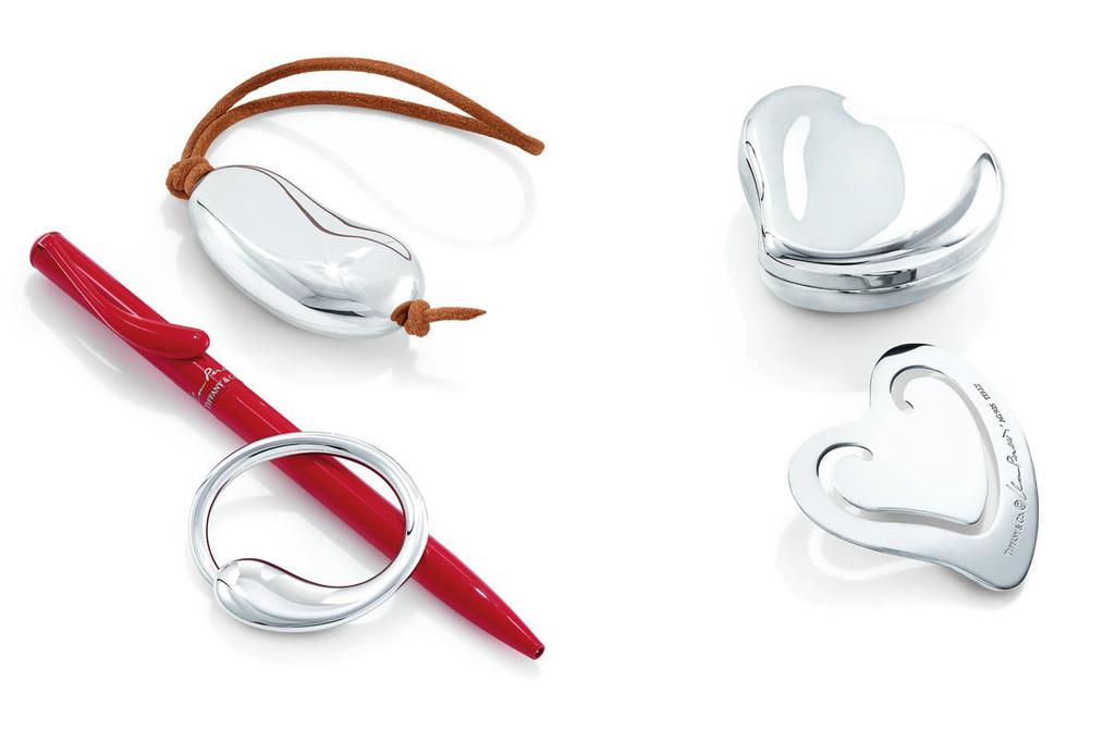 LEFT Elsa Peretti designs. Bean Design key ring in sterling silver with leather, $260. Eternal Circle key ring in sterling silver, $200. Ballpoint pen in red lacquer, $110; available in other colours.