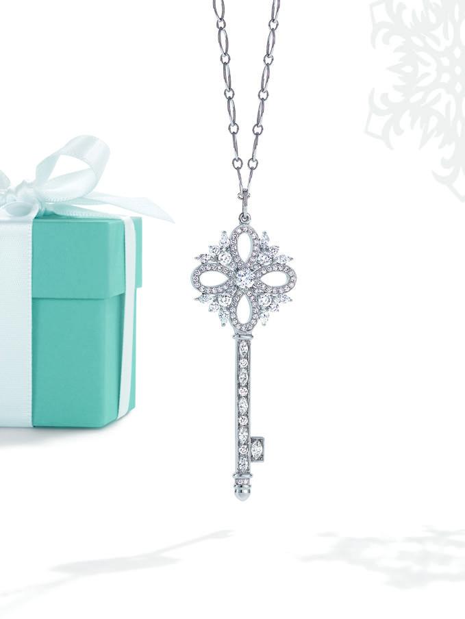 LEFT Tiffany Victoria key pendant in platinum with diamonds, $13,900. Oval link chain in 18k white gold, from $530. Key and chain sold separately.