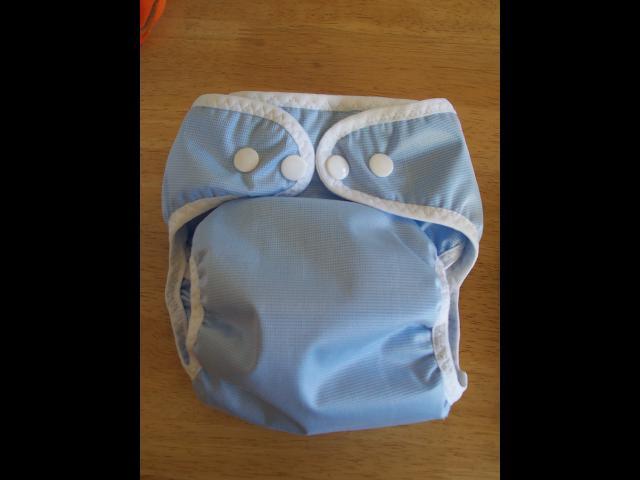If you need to neaten the FOE, sew straight stitch around the entire nappy.