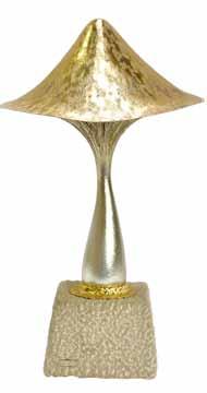 Lawrence, height 33cm. Illustrated. 250-350 (+26.4% BP ) 2126. A silver and silver gilt limited edition ornamental mushroom, The Egg Builders theme, raised on a slate base, London 1982, maker C.N.
