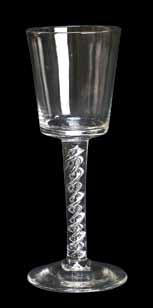 An opaque twist ratafia glass, circa 1765, the trumpet bowl raised on a double series opaque twist stem and plain foot, 16.5cm high. Illustrated. 400-600 (+26.4% BP ) 1088.