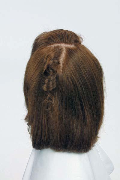 Curl hair by winding a strand around the rod; creates