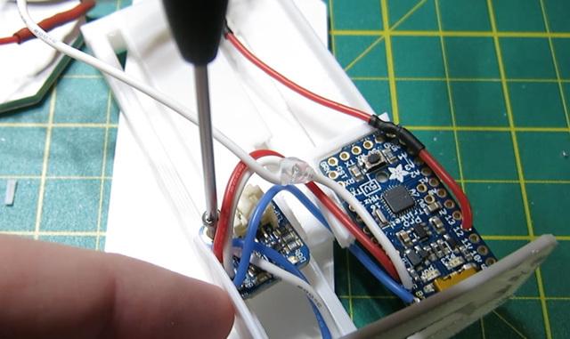 Push the LiPo battery into its pocket, and plug it into the Backpack.