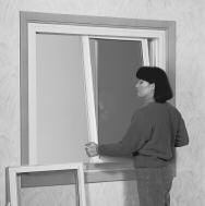 (photo 3) TO REMOVE THE EXTERIOR SASH (OR LEFT SASH), FOLLOW THESE STEPS: 1) Roll the left sash to within 3" of the right side.