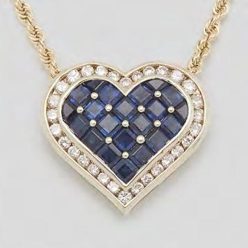 6 grams $2,500 3,500 58 PLATINUM FILIGREE BOW PENDANT set with 166 small old cut diamonds and synthetic sapphires, suspended on a 14k white gold chain length 16 in 40.6 cm, 10.