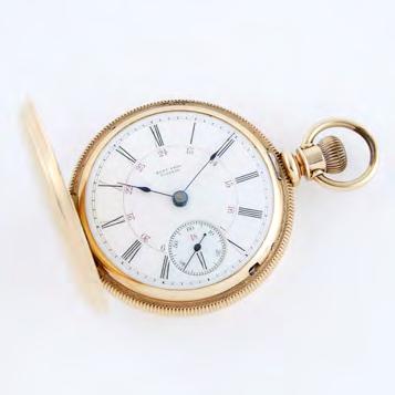 5 grams $500 700 76 ELGIN STEM WIND POCKET WATCH circa 1883; serial #1156438; 8 size; 15 jewel movement; in an 18k yellow gold boxed hinge case, 86.