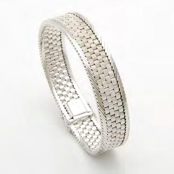 Philippe in the 1960 s $4,500 6,000 108 14K WHITE GOLD SCULPTED RING set with an old mine cut diamond (approx. 1.50ct.
