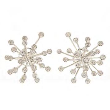 8 grams $2,500 3,500 109 PAIR OF 14K WHITE GOLD DROP EARRINGS each set with a brilliant cut diamond (approx. 0.67ct.
