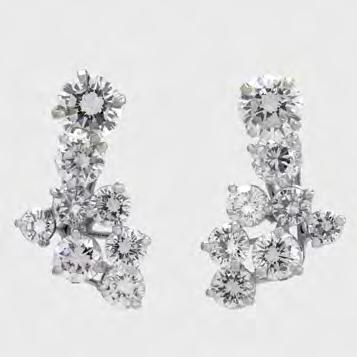 1 cm $1,500 2,000 116 PAIR OF FRENCH 18K WHITE GOLD SCREW-BACK HOOP EARRINGS each set with 22 European cut diamonds (approx. 0.75ct.t.w. per earring), 6.