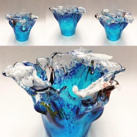 Colors: The bowl is made up of transparent turquoise, cobalt blue, royal blue, clear, white on some of the edges, with hints of medium green, amber and red.
