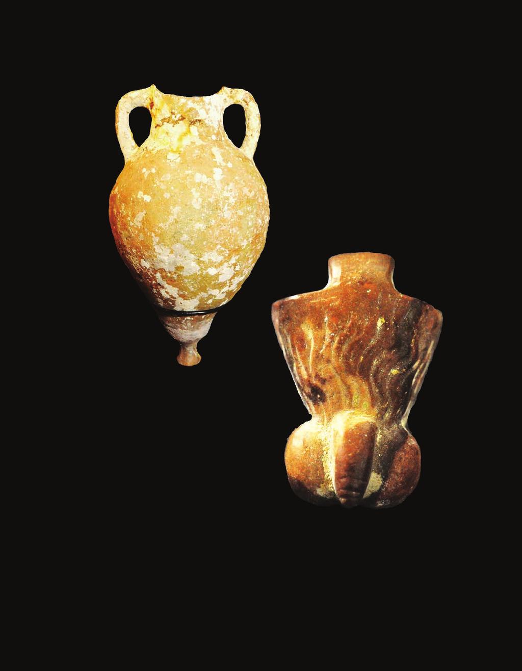 ROMAN VERY LARGE ROMAN TRANSPORT AMPHORA With rounded belly and knob at the bottom, the twin handles joining at the edge of the rim.